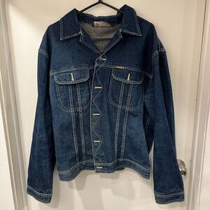 denim jacket with gold accents